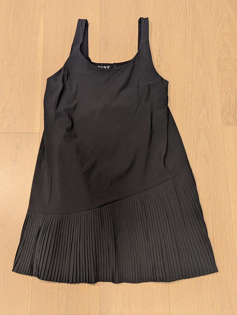 SPANX Black Sleeveless Pleated-Hem Mini Athletic Dress